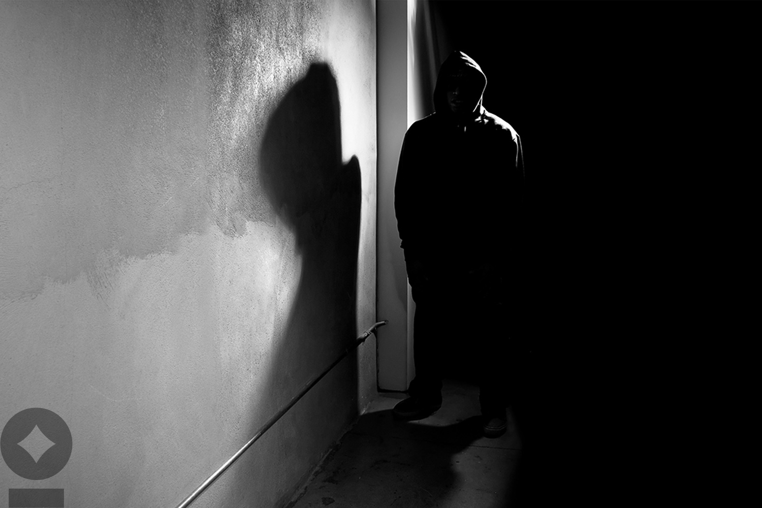 Man standing in a Dark Hallway